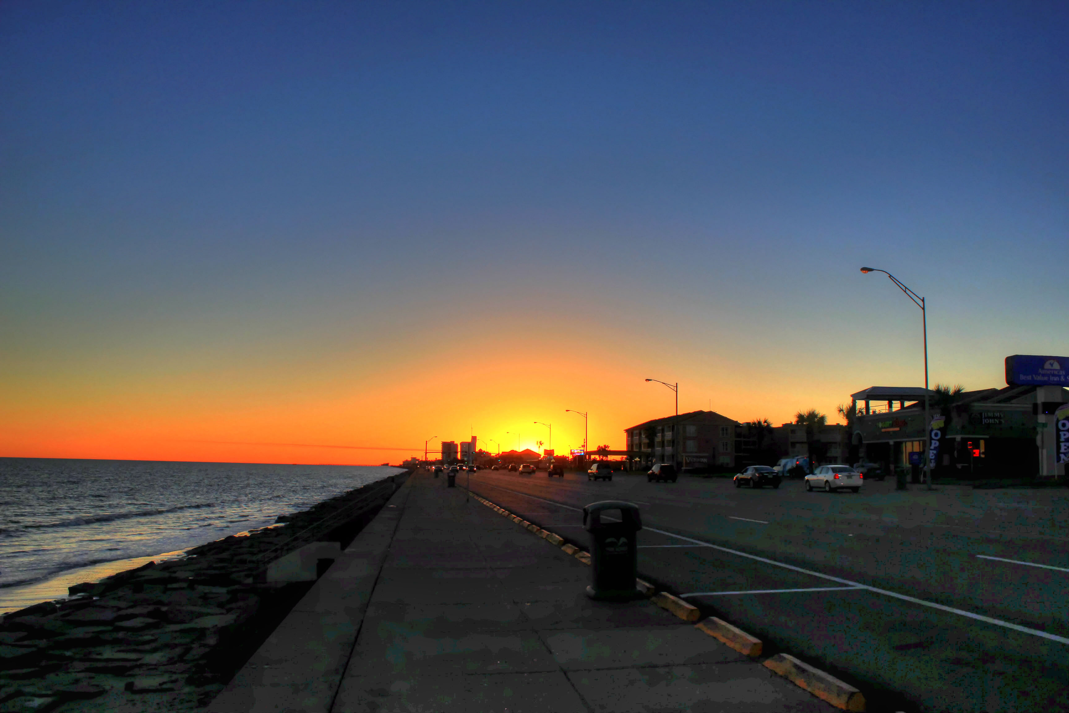 Galveston Seawall at sunset — view from a local restaurant